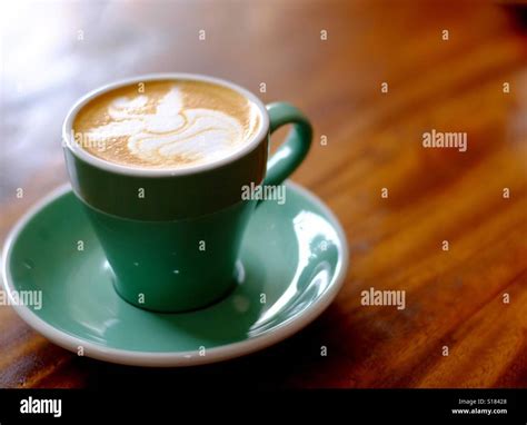 Cup of Piccolo with nice latte art Stock Photo - Alamy