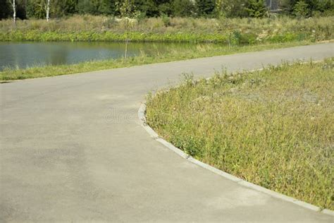 Road In Park Asphalt Path And Green Lawn Improvement Of Park Stock