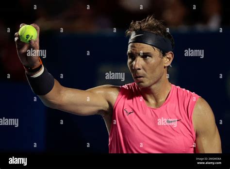 Spain S Rafael Nadal Holds Up A Ball As He Prepares To Serve In His