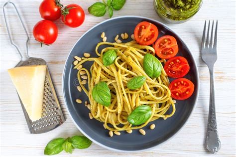 Traditional Italian Spaghetti Pasta With Pesto Sauce And Fresh Basil