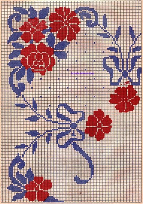 A Cross Stitch Pattern With Red And Blue Flowers