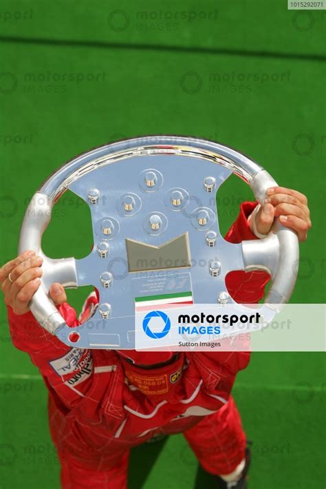 2nd Placed Rubens Barrichello BRA Ferrari With His Trophy Formula