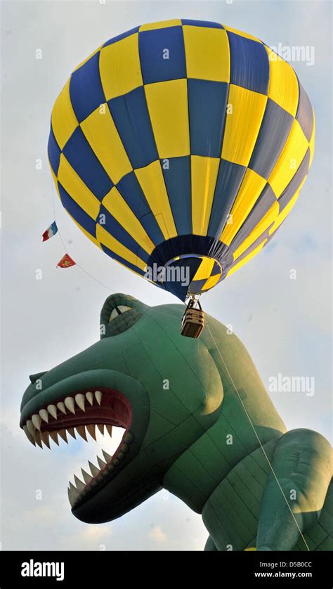 A Dinosaur Balloon Gets Inflated At The 16th Saxonia International