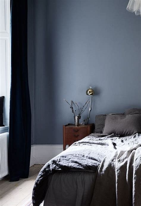 Muted blue walls in a cozy bedroom | Blue bedroom, Home decor bedroom ...