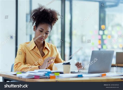 Young African American Businesswoman Working Pile Stock Photo