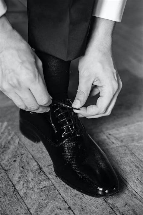 Hands Tying Shoe · Free Stock Photo