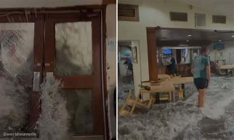 Terrifying Moment Freak Wave Smashes Down Doors Of Army Barracks In The