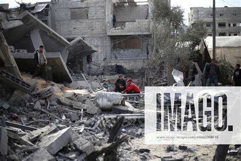 240212 RAFAH Feb 12 2024 Palestinians Check The Rubble Of