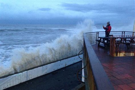 Terrifying CCTV Shows Moment Huge Wave Smashes Through