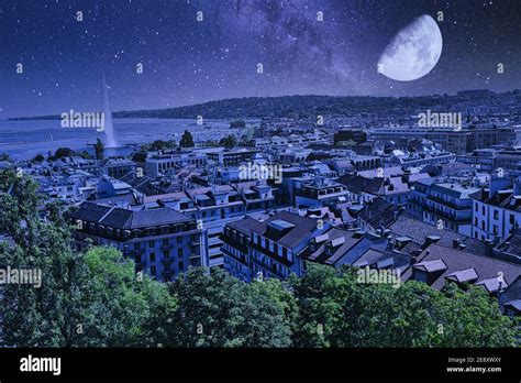 Starry sky with full moon at night over Geneva skyline cityscape ...