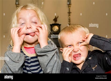 Brother And Sister Pulling A Funny Face Stock Photo Alamy