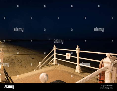 Sea front promenade at night Stock Photo - Alamy