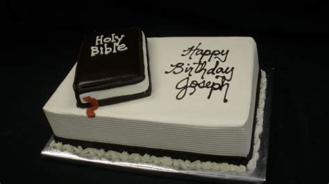 a birthday cake with an open bible on it