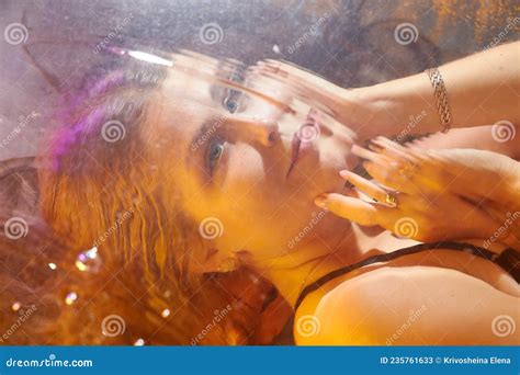 Beautiful Girl With Long Hair Underwater In The Swimming Pool Young