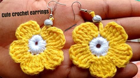 crochet flower earrings in yellow and white