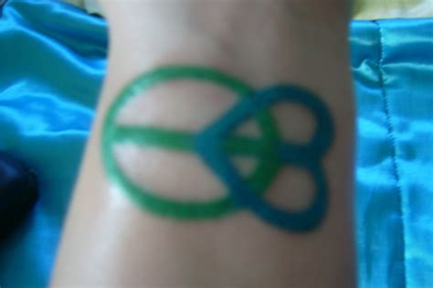 Peace and Love tattoo | Love tattoos, Peace and love, Tattoos