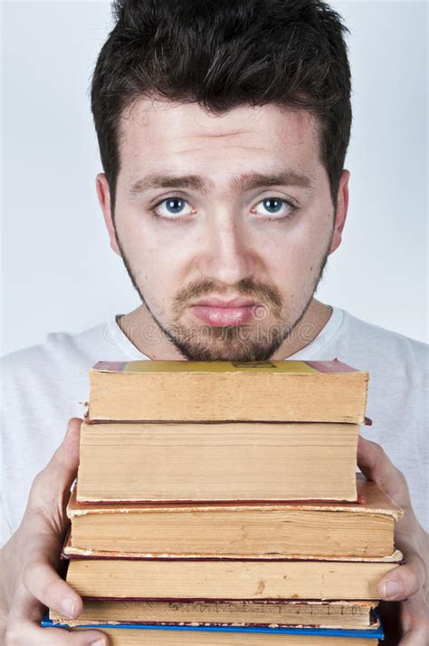 Libros De La Explotación Agrícola Del Hombre Joven Foto de archivo