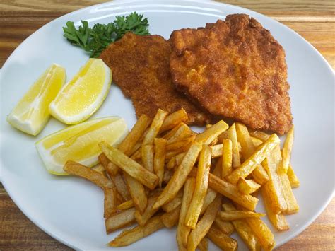 [homemade] Pork Schnitzel With Fries And Lemon R Food