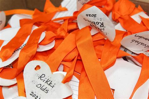 Greenfield Recorder Wear Orange Organizers Prepare Display To