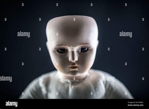 Creepy Doll Face On Dark Background Stock Photo Alamy