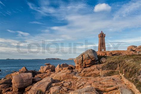 Old lighthouse on the impressive coast in Brittany | Stock image ...