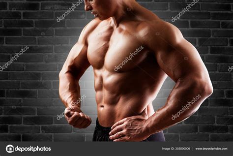 Young Shirtless Man Showing His Muscles — Stock Photo © Billiondigital