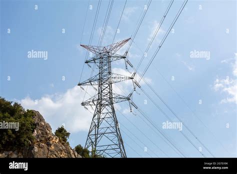 Electric Poles Carrying High Voltage Electricity Stock Photo Alamy