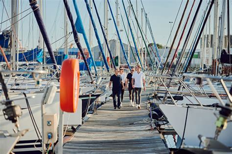 People At A Shipyard Together For A Travel Cruise Of Adventure During