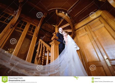 Wedding Couple Indoors Is Hugging Each Other Stock Photo Image Of