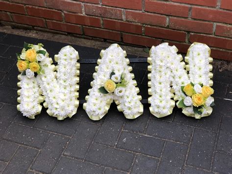 Nan Tribute Funeral Flowers Vanilla Blue Flowers