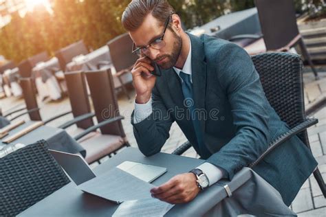 Working From Everywhere Portrait Of Handsome Bearded Businessman In