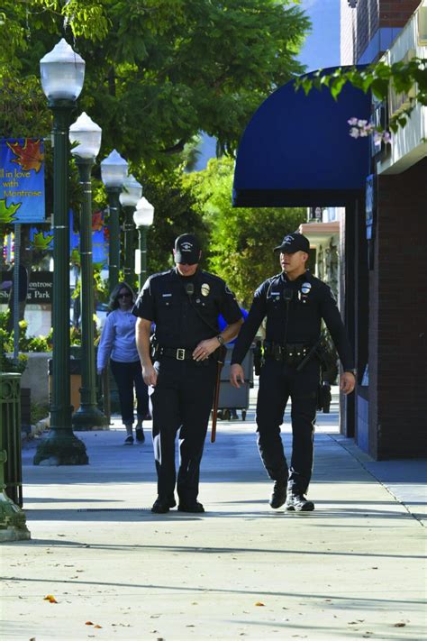 Two Police Officers Walking Police Chief Magazine