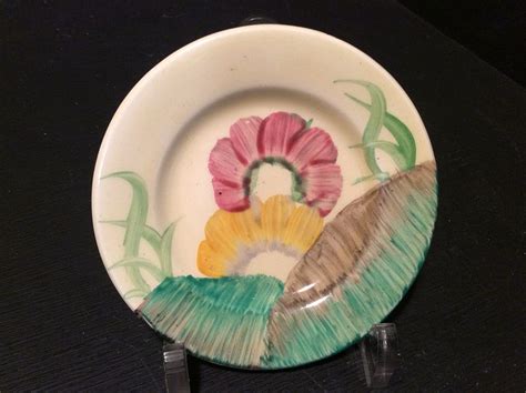 CLARICE CLIFF, AN ULTRA RARE “MINIATURE” PLATE, IN THE AUREA DESIGN ...