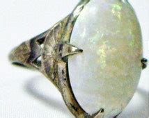 Popular items for harlequin opal ring on Etsy