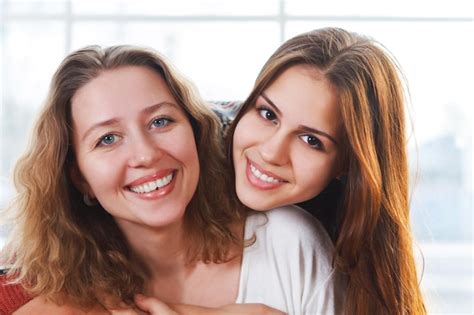 Premium Photo Daughter Embracing Mother At Home