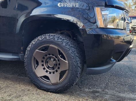 2011 Chevrolet Suburban 1500 With 20x9 12 Black Rhino Muzzle And 285