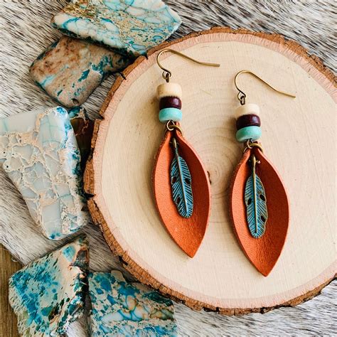 Leather Feather Dangle Earrings In Deep Orange Etsy Handmade