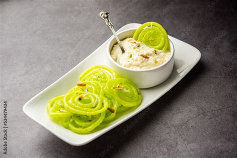 Rabdi Jalebi - Green jilebi or imarati with Rabri made from condensing ...