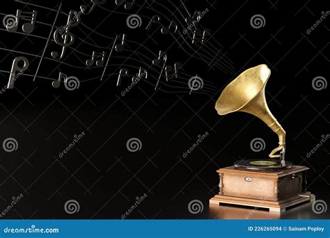 Old Antique Gramophone Or Phonograph And Black Music Notes In Dark