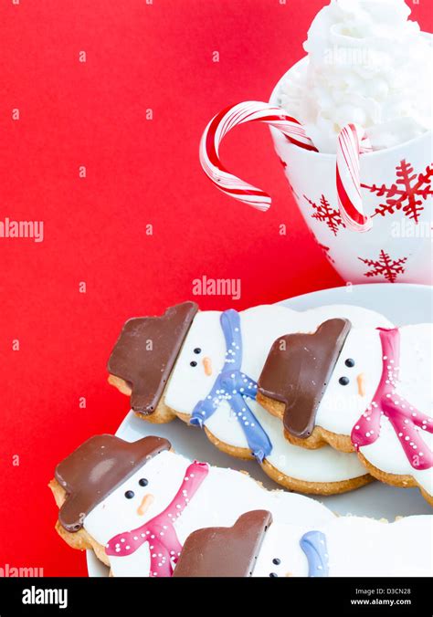 Hot Chocolate With Peppermint Canes And Snowman Sugar Cookies Stock Photo Alamy