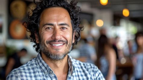 Premium Photo Smiling Man With Curly Hair