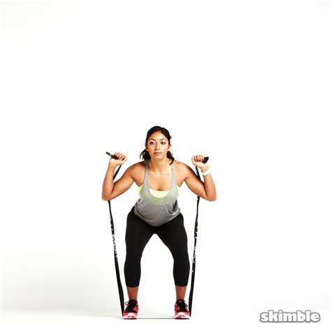 Squats To Shoulder Press With Band Exercise How To Workout Trainer By Skimble