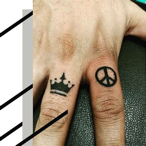 Finger Tattoo Crown And Peace Symbol Hand And Finger Tattoos Men