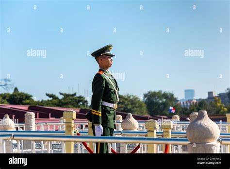 Security Guard Standing In Front Of The Tiananmen Gate At The Entrance