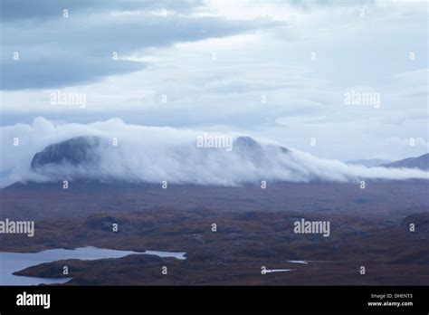 Suilven in clouds at sunrise from Stac Pollaidh Stock Photo - Alamy