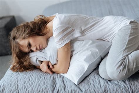 Sad Depressed Woman Lying On The Bed Stock Image Image Of Adult