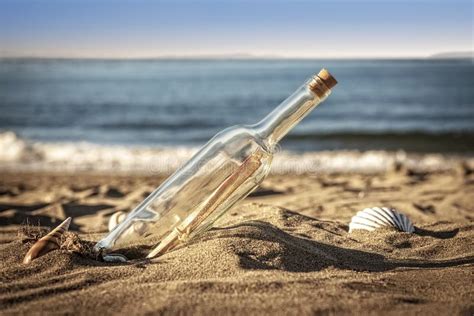 Message In A Bottle On A Deserted Beach Stock Photo - Image of hope, copyspace: 25667258