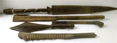 African Ceremonial Wooden Clubs And Swords