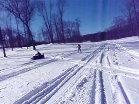 Half Naked Snowboarding Behind Snowmobile YouTube