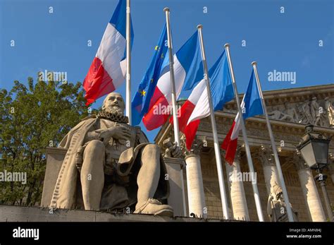 Paris France. French Flag and National Assembly building with statues ...